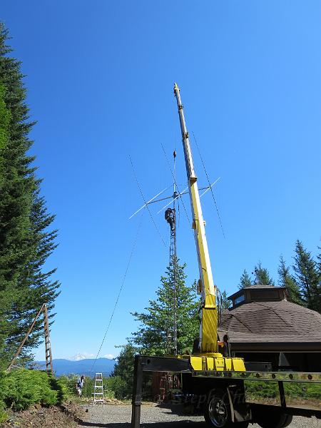 IMG_0669.JPG - Tightening up the rotator clamps to the mast.